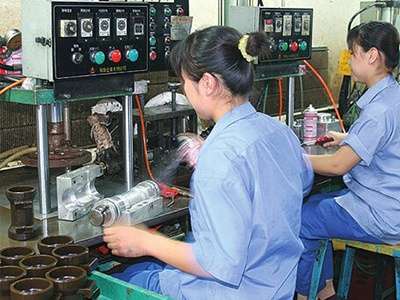 Operators controlling wax injection for investment casting patterns